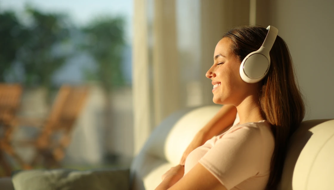 Woman enjoying music with headphones