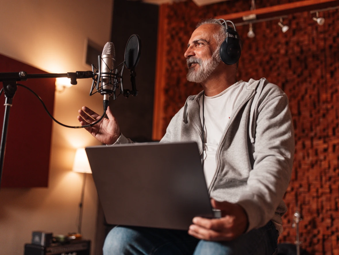 Man recording podcast in studio